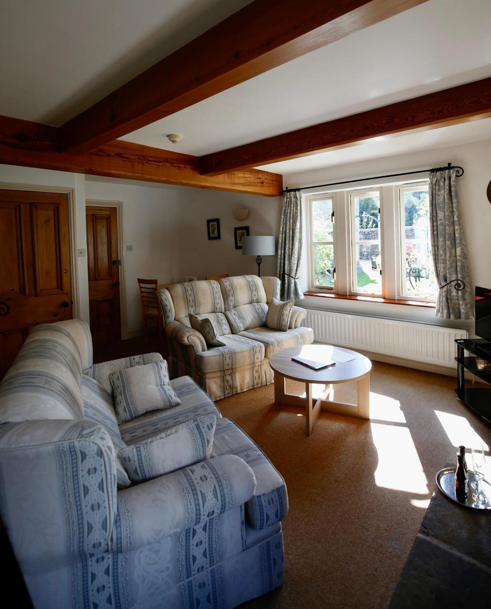 Ashfield House Hotel Grassington Ruang foto The living room at The Old School House